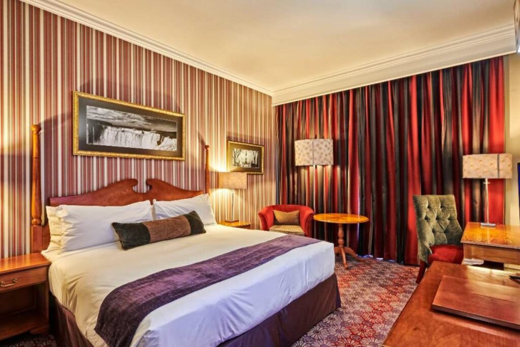 Classic King Room bedroom at Walmont Hotel at Graceland, Secunda