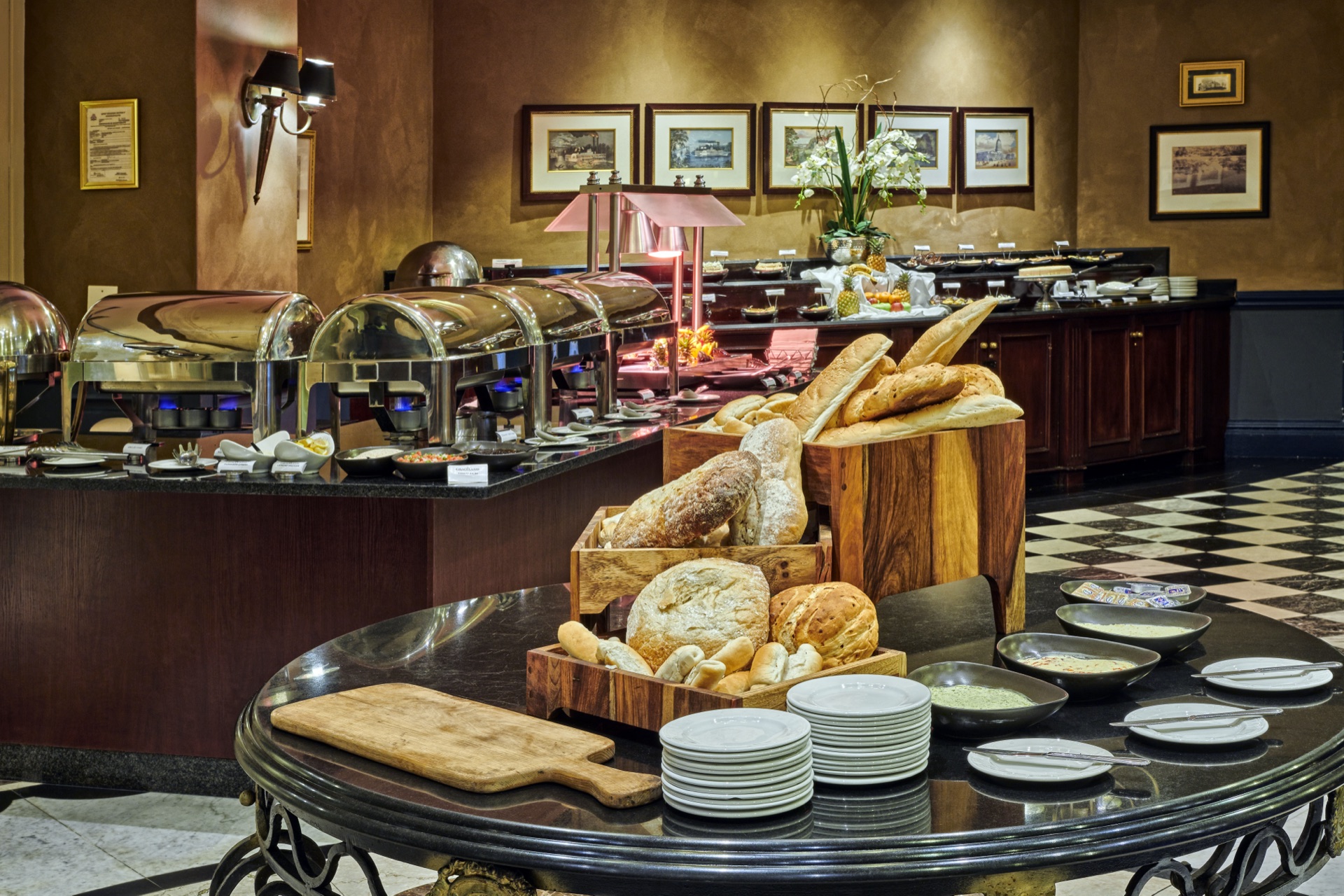 Breakfast buffet with fresh breads and warming trays at Graceland, Secunda